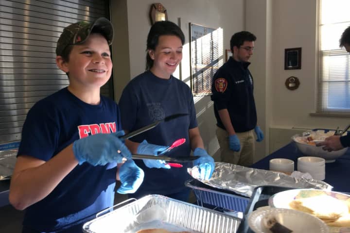Ethan Haberny and Kim Malizia, pictured serving pancakes at the Vista Fire Department&#x27;s pancake breakfast, which was held on Saturday, Oct. 15.
