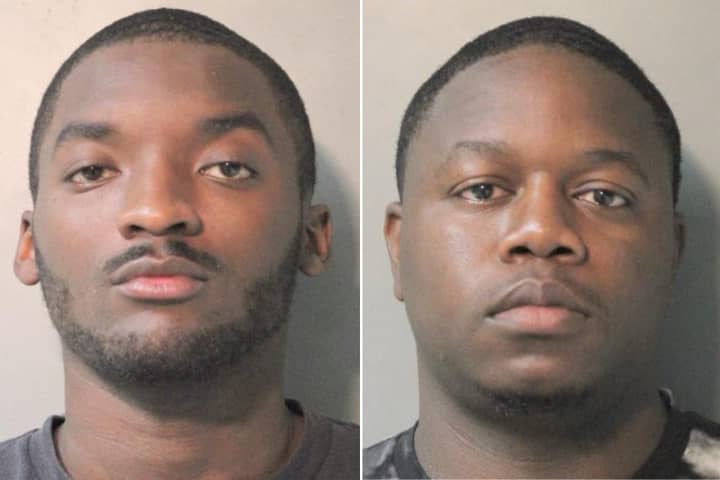 Nicholas Caple (left) and Maurice Tucker were arrested on weapons charges following a traffic stop on the Meadowbrook State Parkway in East Garden City Sunday, Nov. 13.