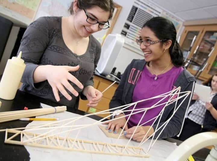Westlake High School science students prepare for an event at a regional Science Olympiad being held this weekend. The 14-member team will build a bridge and a ping pong ball flinging device at the competition in Armonk.