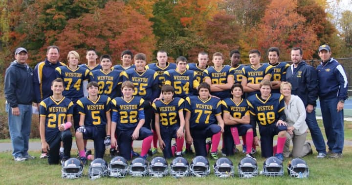 The Weston Trojans 8th grade football team defeated New Canaan, 8-7, in its final regular season game on Saturday. 