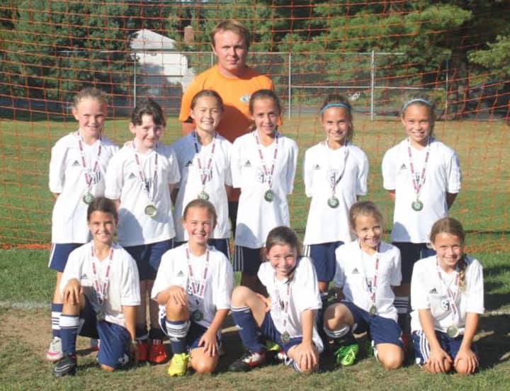 The Wilton U9 girls soccer team went undefeated in a Labor Day Tournament in Farmington. See story for IDs.