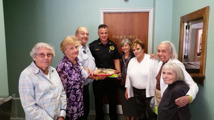 Seniors at Atria show their appreciation to the Briarcliff Police Department.