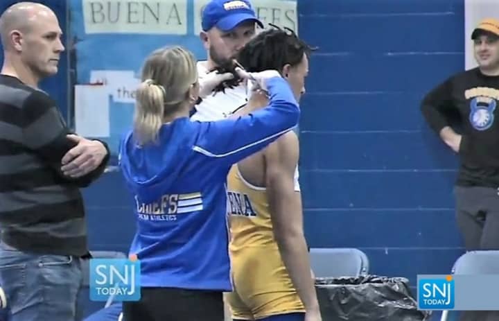 DCR launched its investigation after a 16-year-old Buena Regional High School (Atlantic County) wrestler who identifies as mixed-race had his locs cut while on the mat prior to a match with a wrestler from Oakcrest Regional High School last December.