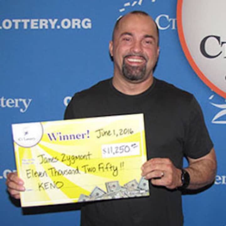 James Zygmont of Trumbull claims $11,250 Keno prize at Connecticut Lottery headquarters.