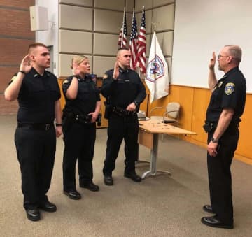 Deputies Collier and Burke and CO Martin were welcomed to the Putnam County Sheriff's Department at a Swearing In ceremony attended by family members.