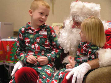 Kids read bedtime stories with Santa last year at the Ringwood Public Library.
