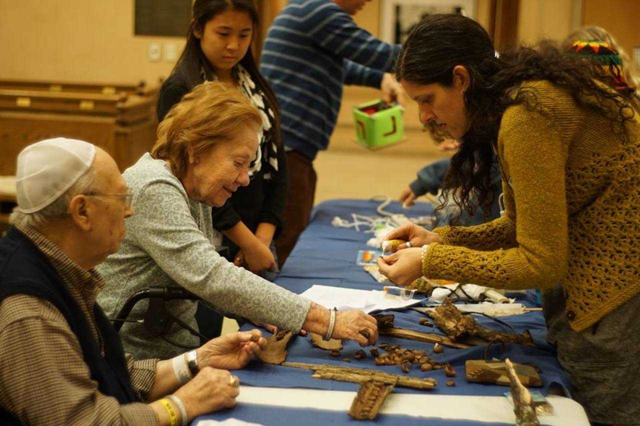 Volunteers work with residents at Jewish Home Family in Rockleigh.