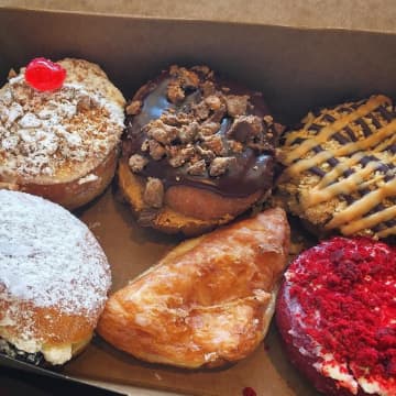 Glaze Donuts in New Milford offers dozens of flavors like maple bacon, cannoli and more.