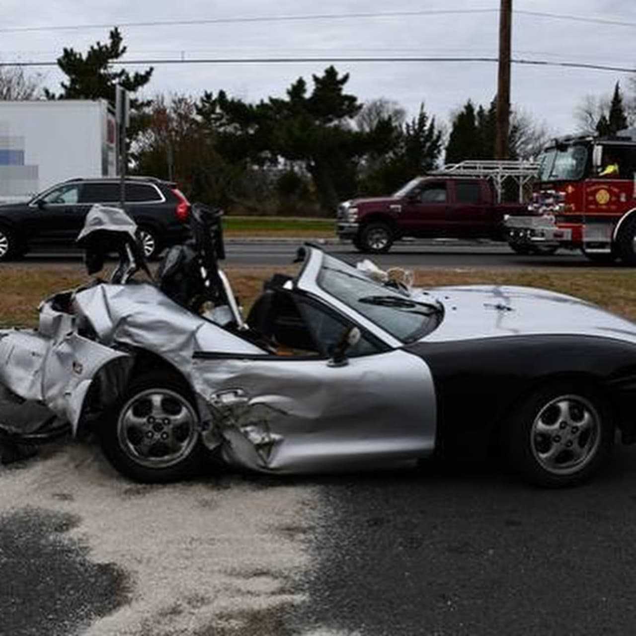 Mazda Miata damaged in the wreck.