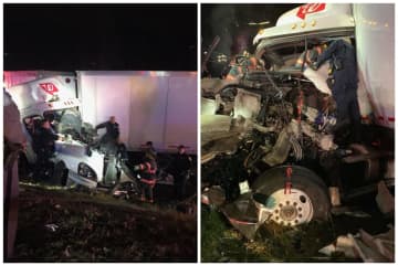 A tractor-trailer driver was injured after crashing into another truck parked on the shoulder of the New York State Thruway in Yonkers.