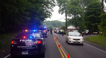 Wilton CERT and Wilton police set up a detour after a three-car crash Friday on Route 7/Danbury Road in Wilton near the Ridgefield border.