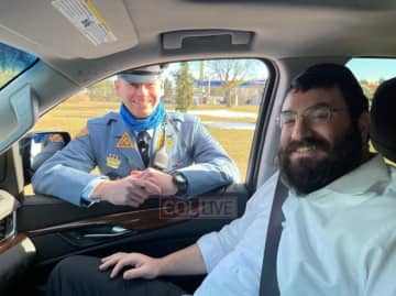 Rabbi Shloime Greenwald and New Jersey State Trooper David Kohn.