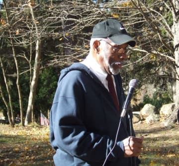 Arthur Taylor, a Korean War veteran, speaks at a Veterans Day ceremony at the African-American Cemetery in Rye.