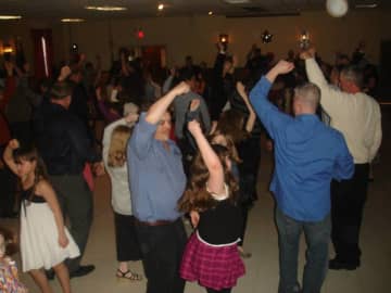 Families dance together at one of the Municipal Drug Alliance's Daddy Daughter Sweetheart Balls in Bloomingdale.