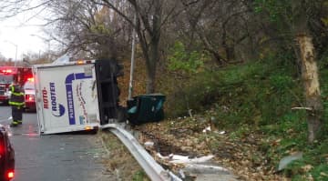 A small box truck rolled over on Martin Luther King Drive in Norwalk on Saturday.