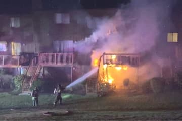 Flames ran the rear wall from the first to the third floor and across the deck