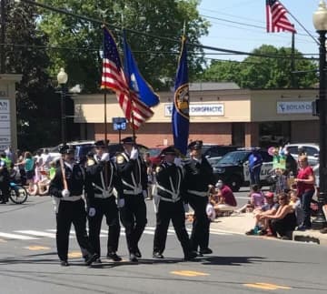 The police honor guard steps off at the front of Bethel's annual Memorial Day Parade held Sunday.