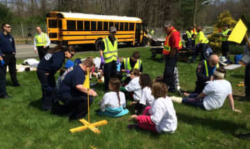 Ringwood Ambulance Corps members teach kids safety precautions.