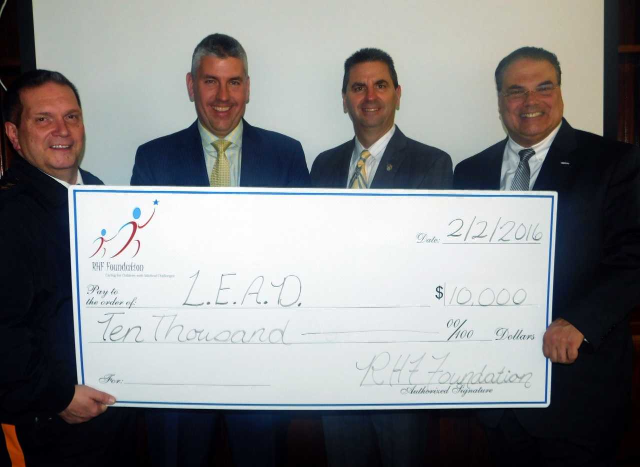 (l. to r.) Montclair University Police Chief Paul Cell, RHFC President Tom Marinaro, Saddle Brook Police Chief Robert Kugler, L.E.A.D. Director Nicholas DeMauro.