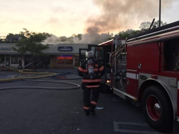 A fire destroyed Nonna's Pizzeria in the Town of Poughkeepsie on Wednesday. Arlington and other area fire departments were able to contain the frie from spreading to adjoining businesses at the 44 Plaza mall at 51 Burnett Blvd.