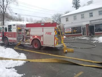 Danbury firefighters only had to cross the street to douse a restaurant fire.