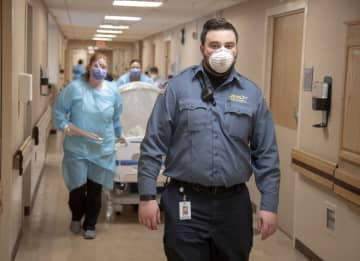 Brendan McLaughlin, 28, of Bergenfield, returned to work as a Holy Name Medical Center security guard Tuesday after being infected with coronavirus.