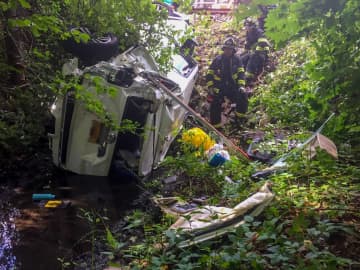 First responders in Scarsdale used a multitude of tools to assist and rescue a driver who rolled her SUV over on the Hutchinson River Parkway.