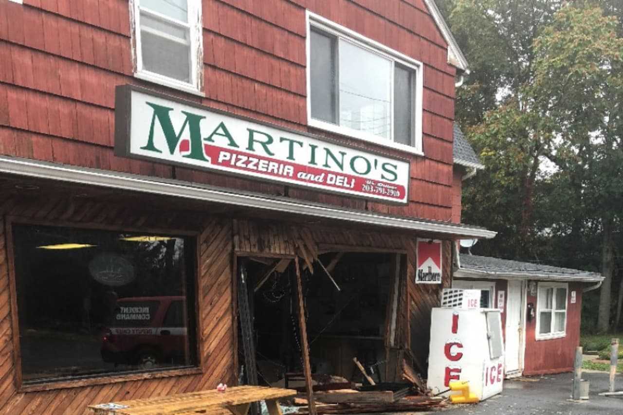 A car smashed in the front of Martino's Pizzeria and Deli, then took off. Now, the community is rallying to help the owner make repairs.
