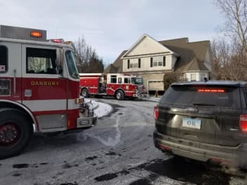 Stony Hill Volunteer Fire Co. and the Danbury Fire Department respond to a water problem at a condo off Shelter Rock Road in Danbury on Tuesday. E26, S1, and E3 are at the scene.