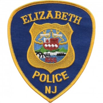 New Jersey's Attorney General Friday called for Elizabeth's Public Safety Director to step down.