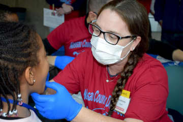 More than 350 volunteers and 100 dentists provided free dental screenings, fluoride treatments and oral hygiene instruction to 1,500 underserved and special needs children as part of Nassau County Dental Society’s 17th annual “Give Kids a Smile Day.”