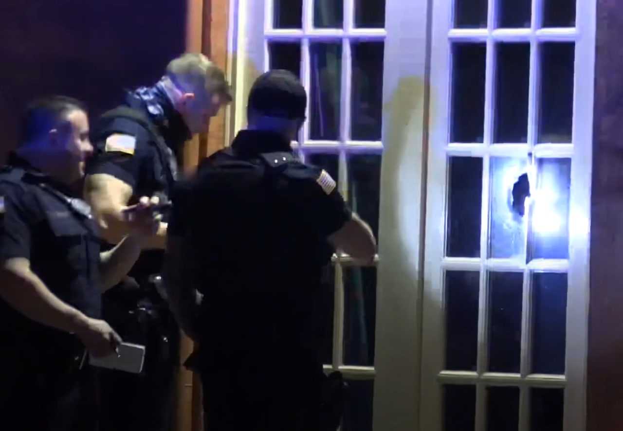 A window was smashed at Medical Options on Straight Street during Sunday night's shooting in Paterson.