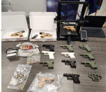 The 'ghost' guns and printer were seized during the arrest.