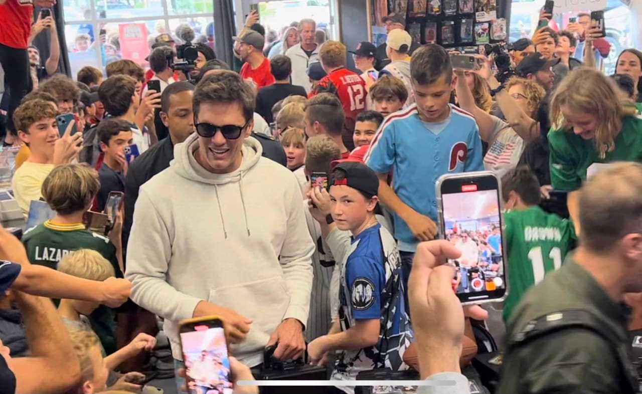 Tom Brady Makes Surprise Visit to Trading Card Store with Kevin