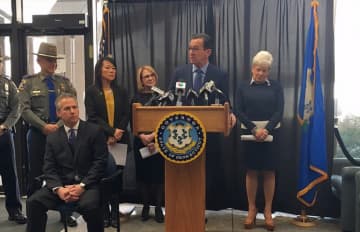Gov. Dannel Malloy proposes a ban on the purchase and sale of bump stocks, binary triggers systems, and trigger cranks in Connecticut during a press conference Tuesday.