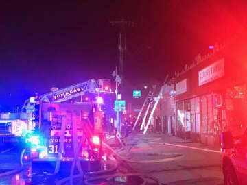 Several commercial buildings were damaged during a two-alarm fire in Yonkers.