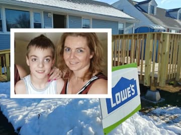Rebuilding Together North Jersey completed an unfinished ramp for Tracy Kulick and her son, Matthew, 10.