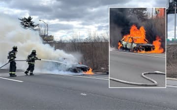 Hackensack firefighters doused the car blaze on Route 80.
