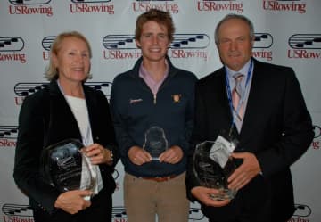 Andrew Campbell, center, of New Canaan celebrates an award with Yan Vengerovskiy, right, and his wife, Olga, at a USRowing event in 2011.