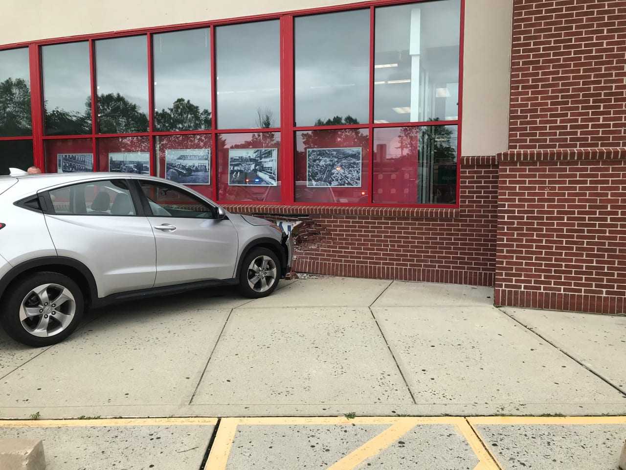 <p>A driver lost control and drove into the side of a Norwalk CVS store.</p>