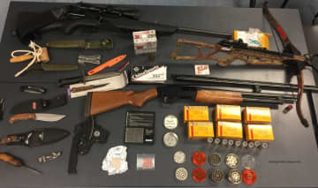 The guns and weapons seized.