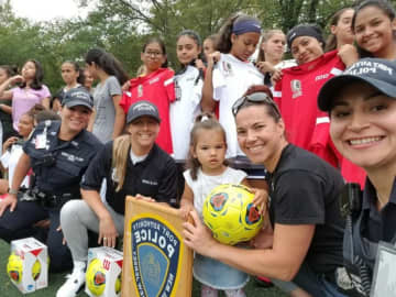 Port Authority police officers based at Newark Airport bought new uniforms for the girls soccer team at East Side High.