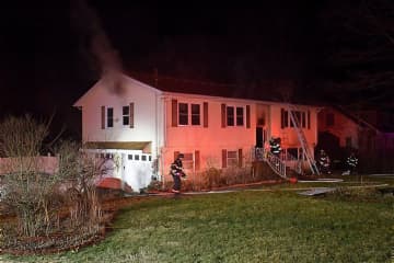 A resident was able to escape injury during a fire at a Danbury home.