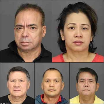 Six employees at the Century Golf Club in Purchase are charged with scamming more than $100,000 in unemployment benefits while they were overseas.