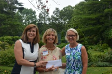 Barbara Fitzpatrick, Director of STAR’s Rubino Family Center and Birth to Three Program is flanked by Carrie Bernier and Amy Wilkinson from The Community Fund of Darien.