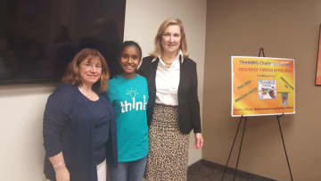 Jothi Ramaswamy, the 14-year-old founder of ThinkSTEAM, middle, with Tierney Saccavino of Acorda Therapeutics, and Patricia Viggiano of Lakeland High School.