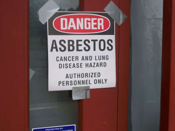 Asbestos warning sign photo illustration