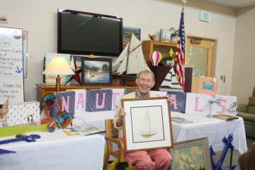 Bill Gray shows off his nautical background as part of a recent Waveny Adult Day Program in New Canaan.