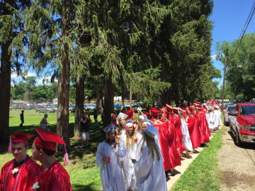 Red Hook students walk to their graduation ceremony