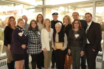 Mary “Edie” Meeks with Northern Westchester Hospital staff.